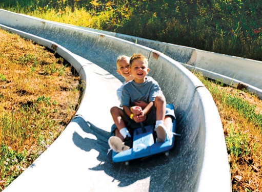 Children zip down the slipine slide every summer at Park City Mountain Resort.